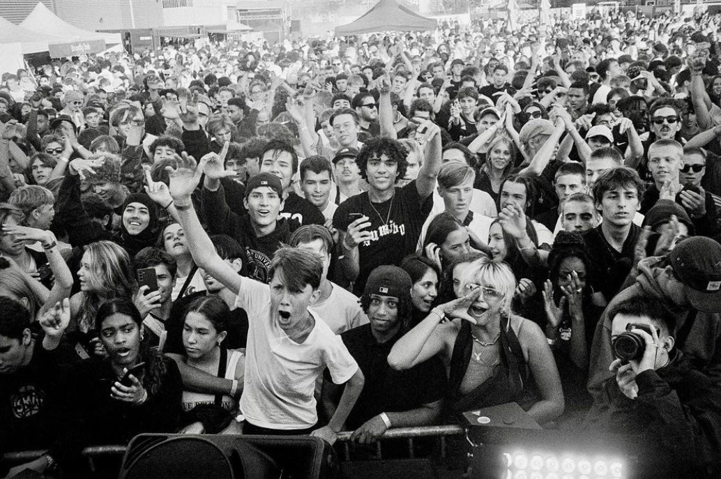 Black and white photo of a large crowd at an outdoor event